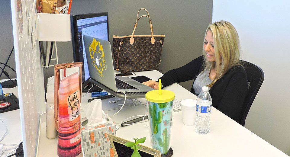 Genius Monkey employees at the office.