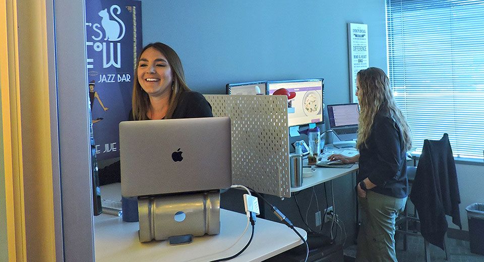 Genius Monkey employees at the office.